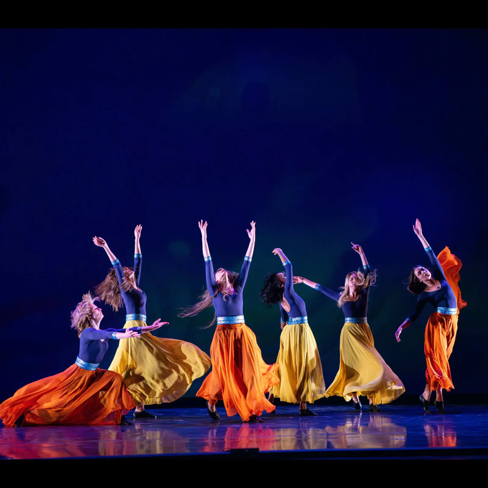 The Khazan ensemble moving through a low, expansive formation