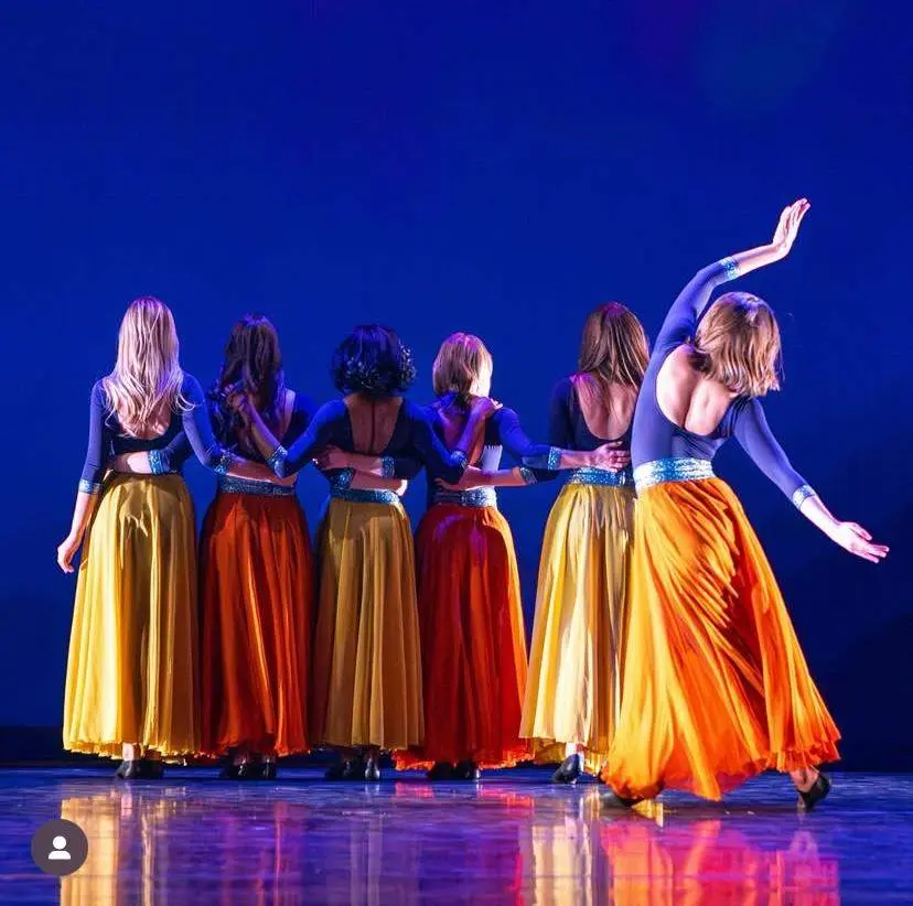 The Khazan ensemble gathered in a close circular formation