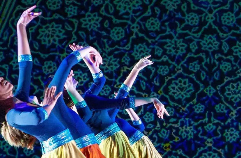 Khazan dancers creating layered gestures with their hands